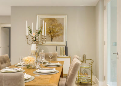 Beau Property Dinning Room home staging and interior design with candle