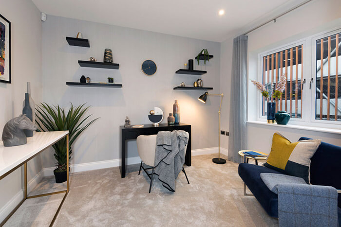 Professionally staged home by Beau Property Home Staging. Show home bedroom featuring colour matched/themed furniture, standing lamp and black desk