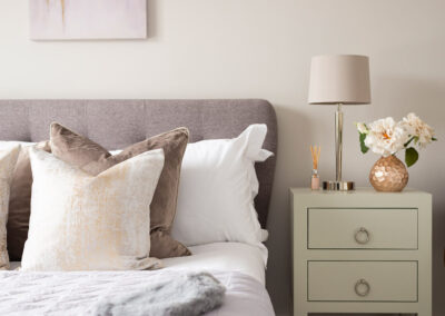 Professionally staged home by Beau Property Home Staging. Show home bedroom with side table and colour matched lamp