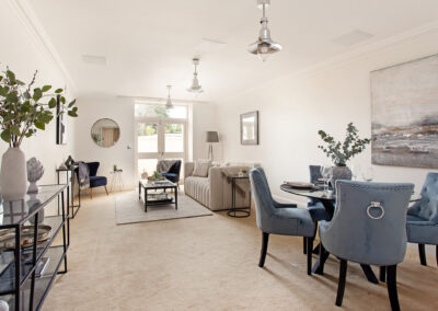 Professionally staged home by Beau Property Home Staging. Show home lounge/dining area