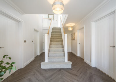 Professionally staged home by Beau Property Home Staging. Show home hallway