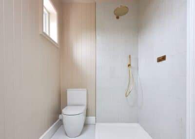 Pre-staging photo of washroom, in comparison very plain and doesn't feel very homely.