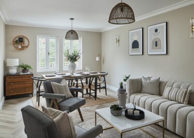 Open plan living & dining area of Tunbridge Wells staged home. Designer furniture with added ornaments for extra detail. Plants thoughtfully placed around the room, bringing in colour and a fresh & welcoming feel to this home.